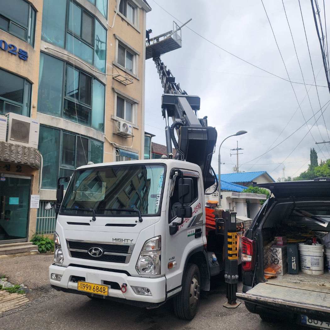 자재 양중 스카이차 작업사진